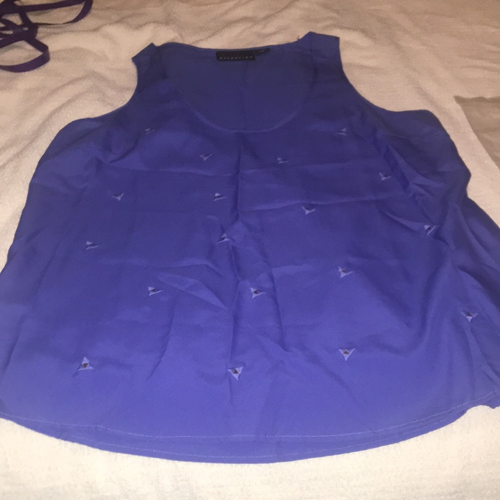 Beautiful blue sleeveless embellished Blouse